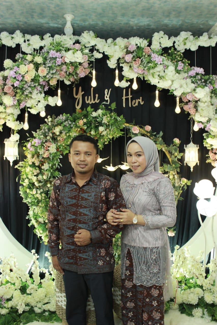 Undangan Pernikahan The Wedding of Yuli and Heri